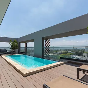 https://modern-luxury-condo-with-pool-gym.greaterantilleshotels.net